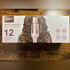 Curling iron w/ 2 changeable barrels.